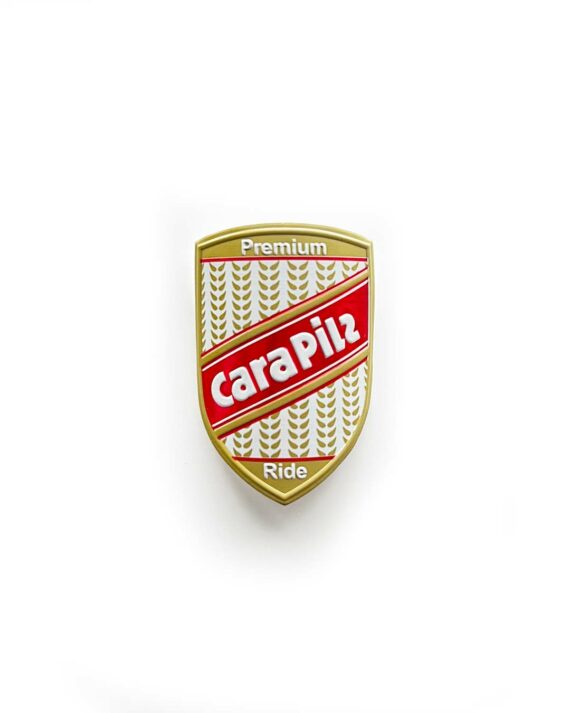 Cara Pils Headbadge