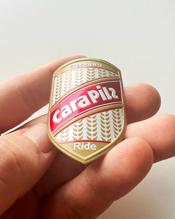 Cara Pils Headbadge